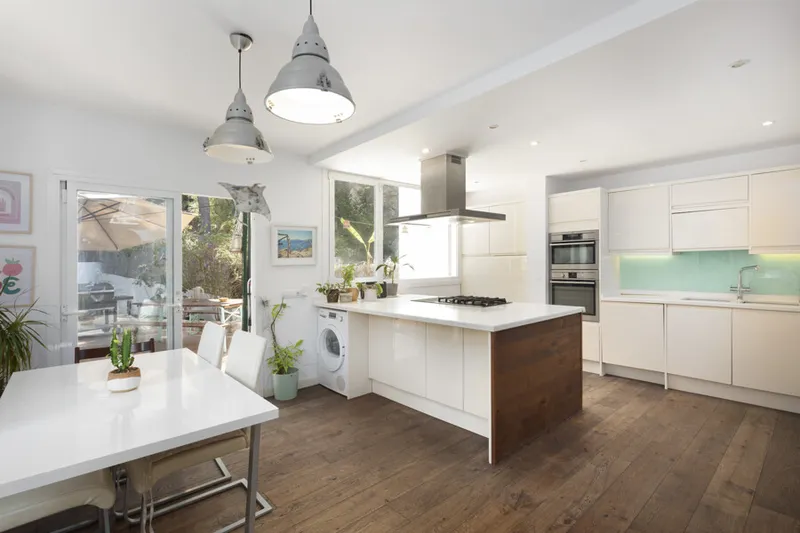 Elegant Four-Bedroom Semi-Detached Home with Terraces, Garden & Garage in Tranquil Cala Nova — photo 2