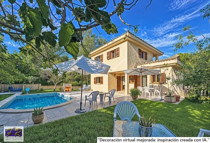 We present this magnificent single-family home, located in the sought-after Bonaire urbanization in Alcudia. Built in 2008 with a high — photo 3