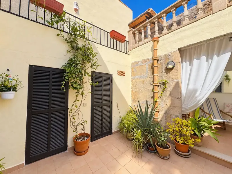 Distributed over 3 floors with great charm, this renovated 144 m2 house in Pollensa has a patio and terraces of approx. 44 m2, 3 ha — photo 11