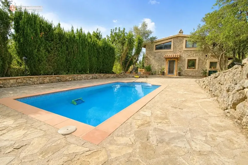 In a privileged natural setting in Bunyola, surrounded by Mediterranean vegetation and mountains, we present this unique single-family home — photo 10