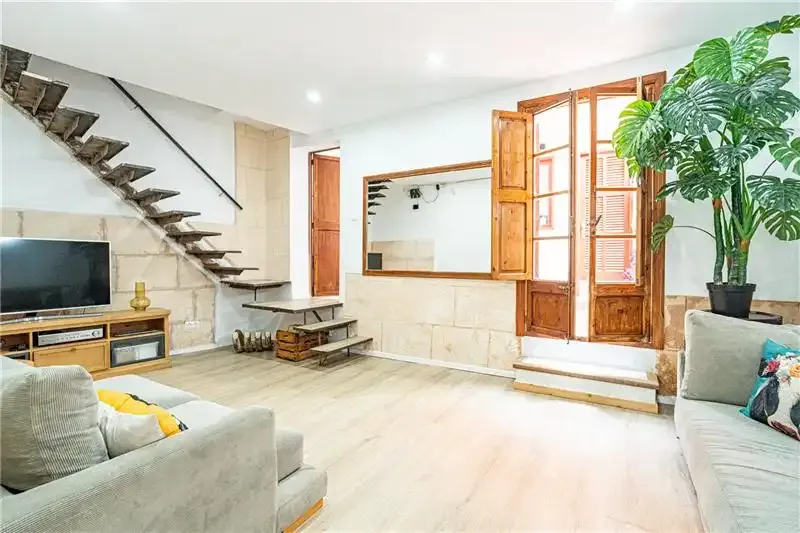 Townhouse in Selva, a home of approximately 176 m2 built, distributed over two floors. On the ground floor we find a living room — photo 1