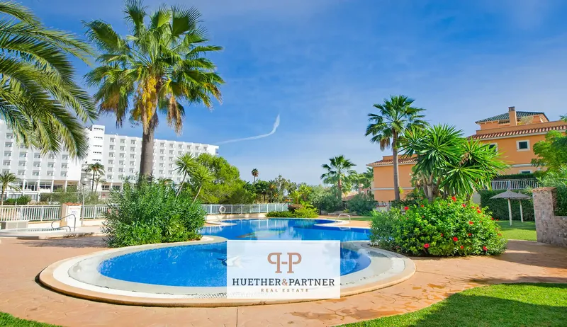 This apartment in Cales de Mallorca stands out as a penthouse close to the beach with a private rooftop terrace and communal pool, ideal for — photo 2