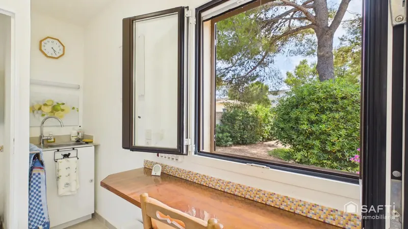 Cozy urban chalet with a large garden in Calas de Mallorca — photo 12
