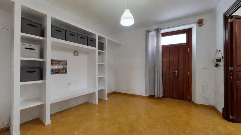 In the heart of Porreres, this spacious village house stands out for its generous dimensions and variety of spaces — photo 6