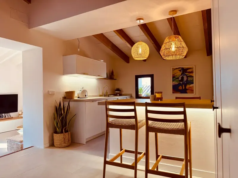 This stylishly modernized penthouse is located in the heart of Artà's old town. — photo 3