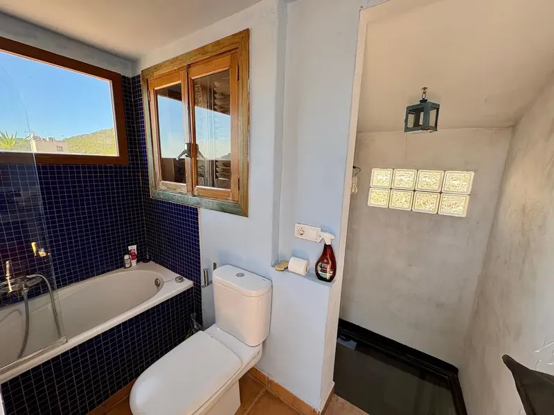 In the center of Andratx, this cozy penthouse is located in a Mallorcan house divided horizontally into two. — photo 10