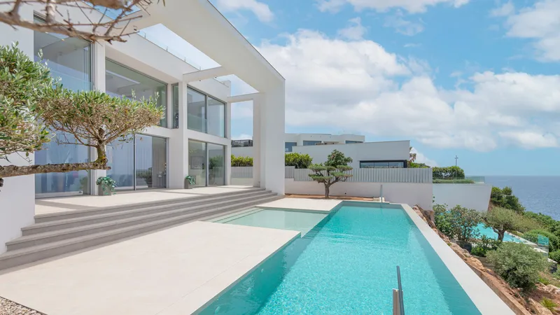 Spectacular designer villa for sale in Port Adriano with harbor and sea views — photo 1
