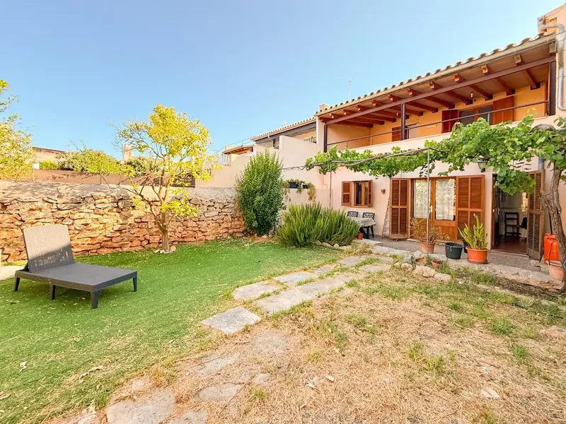 Discover this charming village house in the heart of Binissalem, combining the essence of Mallorcan rustic style with modern comforts — photo 1