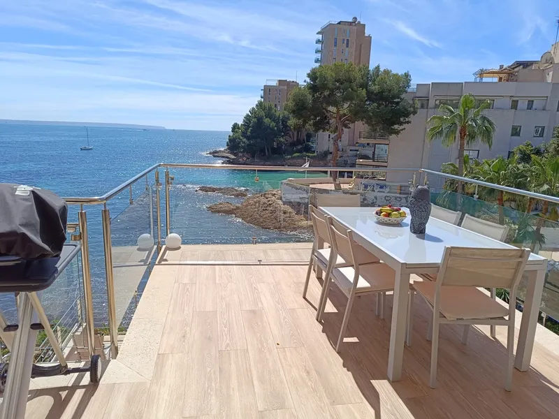 Sea view penthouse in Cas Catala with direct beach access — photo 1
