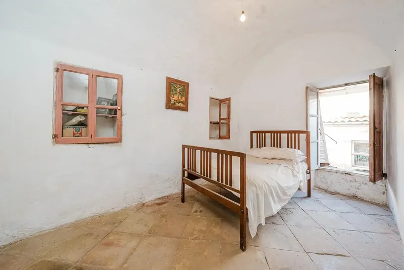 This house for renovation is located in Sant Llorenç, in an area with year-round activity in Mallorca. From gestpropiedad, real estate — photo 11