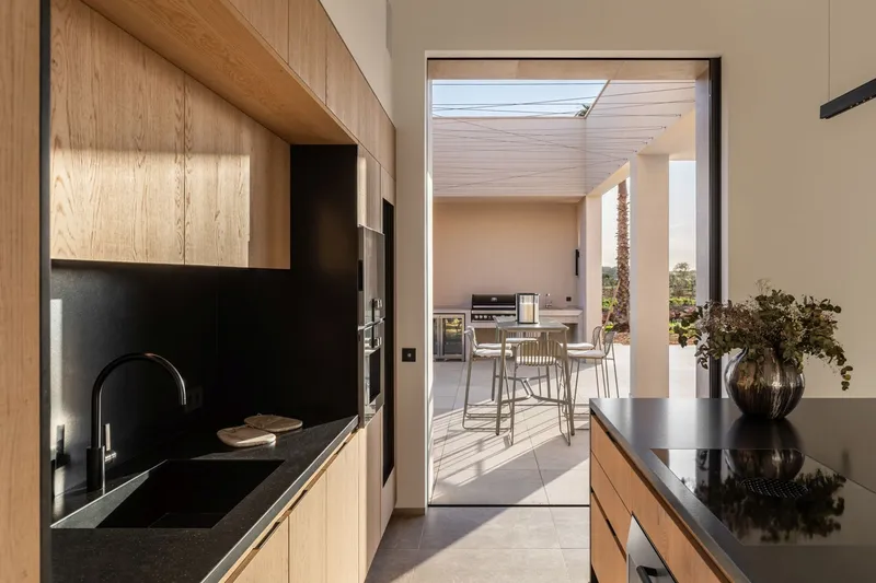 New build finca with modern natural stone facade and panoramic views in Cala Llombards — photo 10