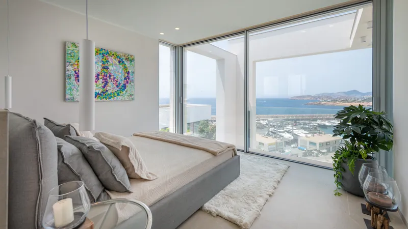 Spectacular designer villa for sale in Port Adriano with harbor and sea views — photo 11