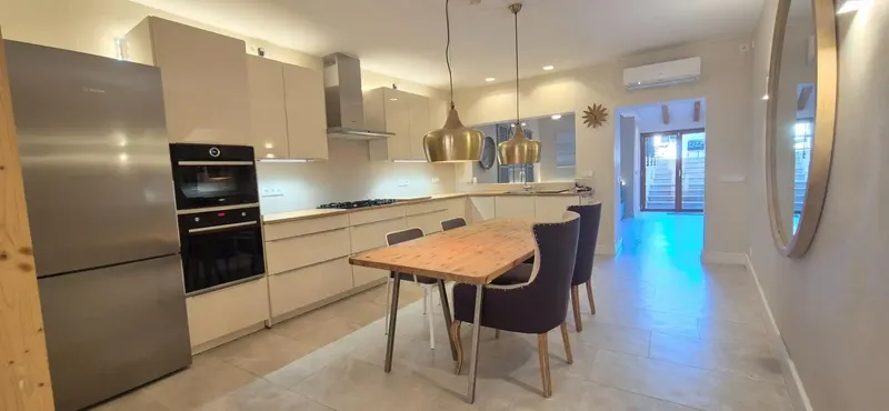 On a quiet street and just a minute's walk from the central square, this home offers the perfect balance of privacy, comfort — photo 5