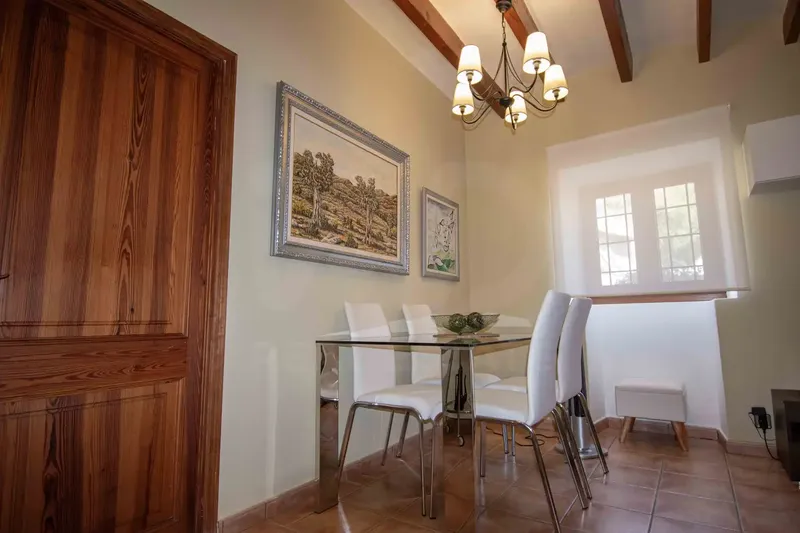 Located in the charming village of Es Capdellà, this village house offers exceptional quality of life in one of the most authentic corners — photo 11