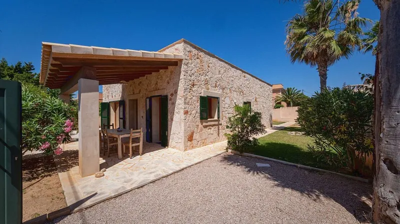 Natural stone chalet in Cap des Moro – with roof terrace and sea views — photo 1