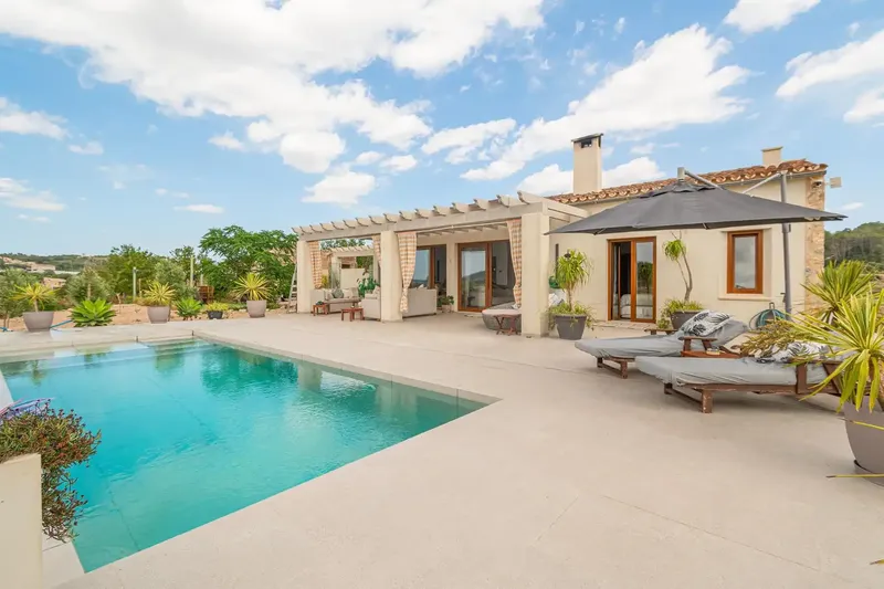 This newly built, high-specification finca in Sant Joan offers an exquisite fusion of contemporary comfort and authentic charm — photo 1