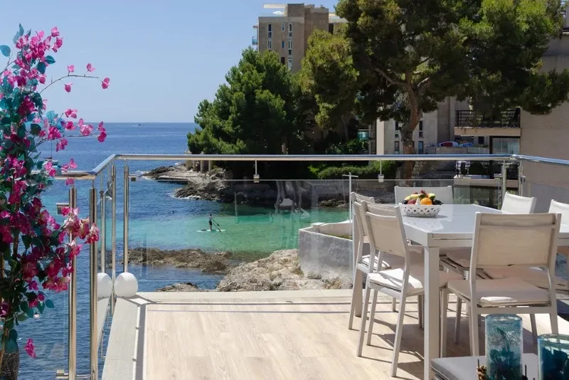 Seafront penthouse in Cas Català with direct beach access and sea views — photo 1