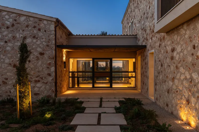 New build finca with modern natural stone facade and panoramic views in Cala Llombards — photo 4