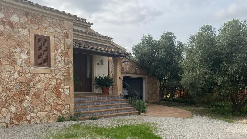 Country house with a stone façade, pool, and olive plantation in Llucmajor — photo 4