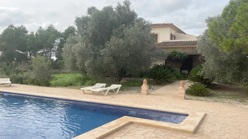 Country house with a stone façade, pool, and olive plantation in Llucmajor — photo 2