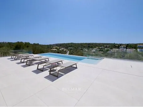 Modern villa with a pool near the beach in Cala Mendia — photo 1