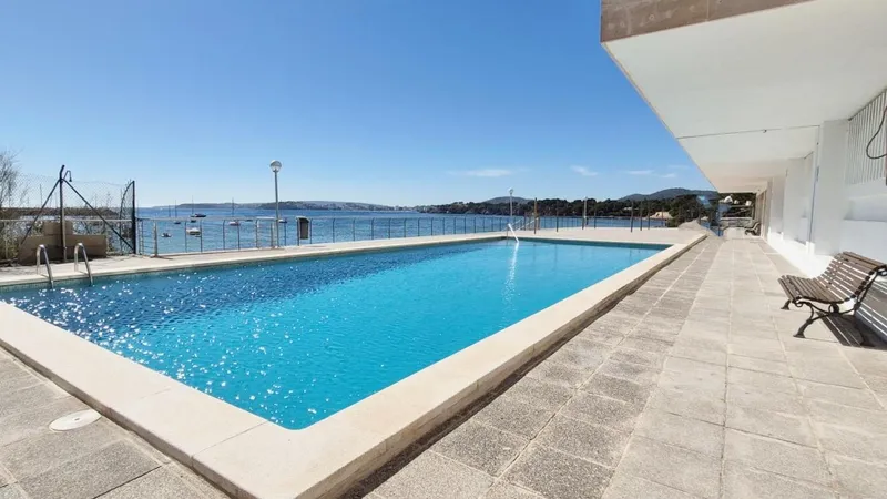 For Sale in Portals - Newly Renovated Penthouse Beach Apartment with Sea View Swimming Pool and Parking — photo 1
