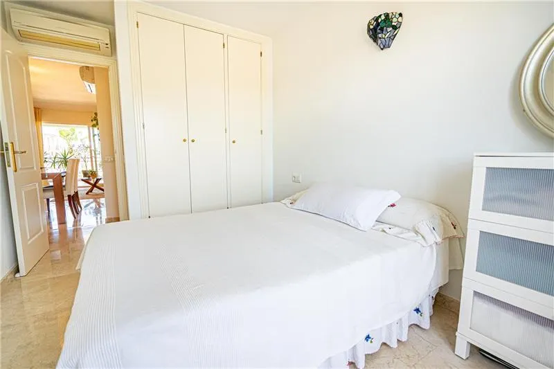 Apartment with a terrace of approx. 32 m² offering views of the forest, in a residential complex with swimming pools — photo 11