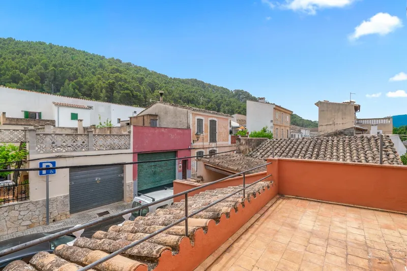 Village house with terrace and sunny patio — photo 9