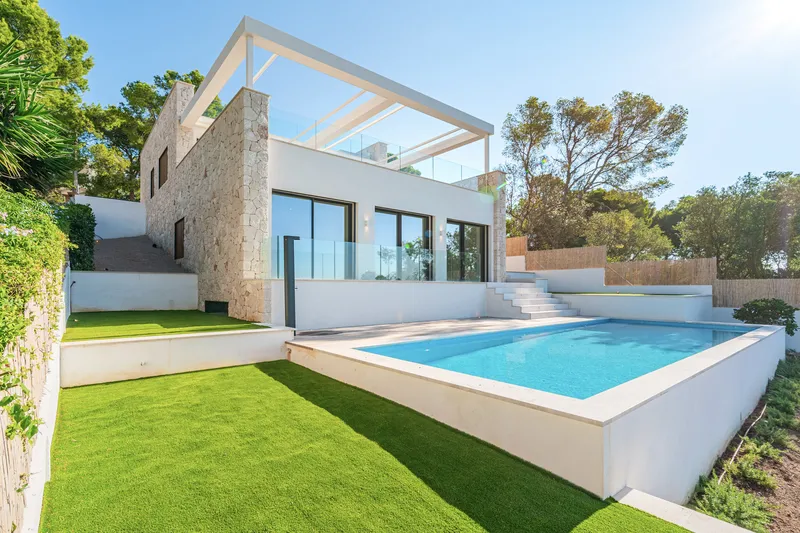 Villa in Portals Nous - view of the house with garden and pool — photo 10