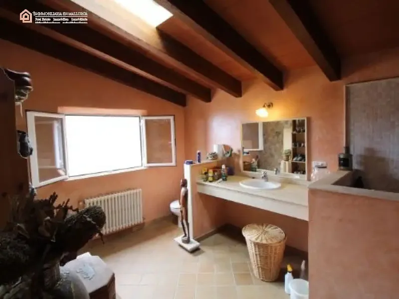 This beautiful stone house is located in Biniaraix, one of the most beautiful and picturesque villages in Spain. — photo 12