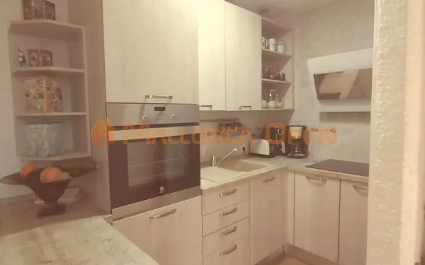 Ground floor with private garden and communal pool in Cala Mandia — photo 2