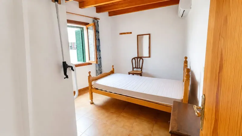 This house in Pollença has 112 m2 of living space plus a 40 m2 vaulted cellar and a rooftop terrace of approx. 20 m — photo 11