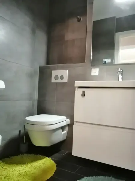 This is a completely renovated ground-floor property in very good condition. It is located in Port Adriano, accessed via the slope — photo 11