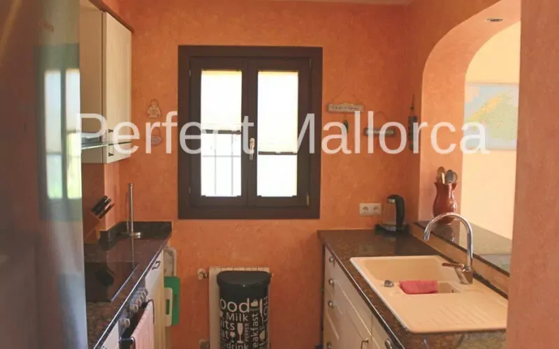 End townhouse overlooking the beach in a well maintained complex with pool in Cala Murada — photo 12