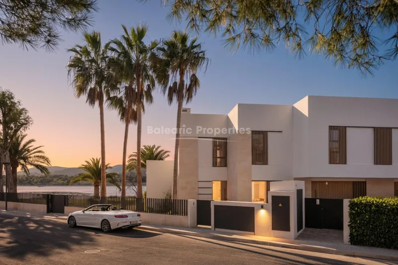 Mid terrace houses for sale near the beach in Puerto Alcudia, Mallorca — photo 1