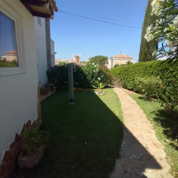 Ground floor with private garden and communal pool in Cala Mandia — photo 12