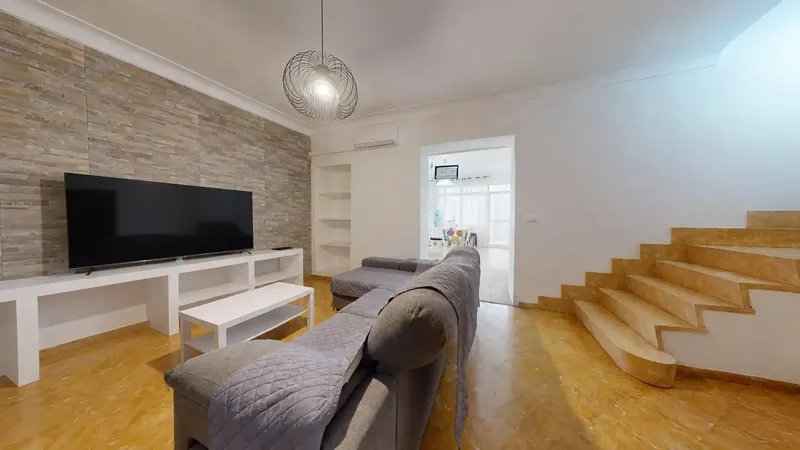 In the heart of Porreres, this spacious village house stands out for its generous dimensions and variety of spaces — photo 2