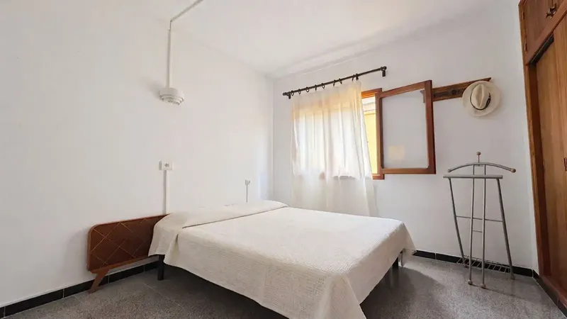 This building of 4 homes in Colonia Sant Jordi, distributed in 2 apartments on the ground floor, 2 apartments on the first floor, and a semi-basement with patio — photo 7