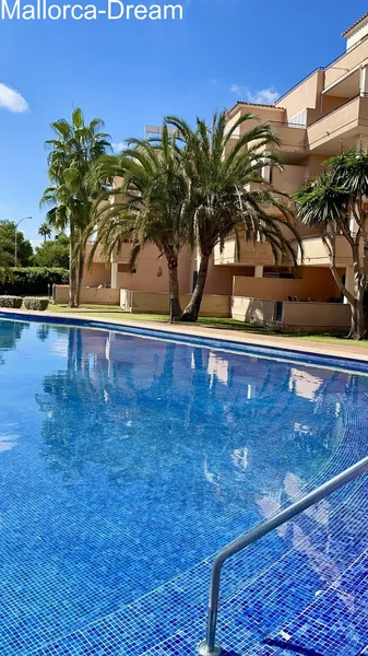 Sa Coma: Modernized ground floor apartment with approx. 60 m² terraces, fantastic pool area, underground parking space & storage room — photo 3