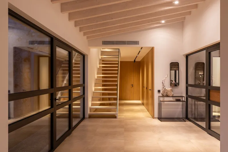 New build finca with modern natural stone facade and panoramic views in Cala Llombards — photo 11