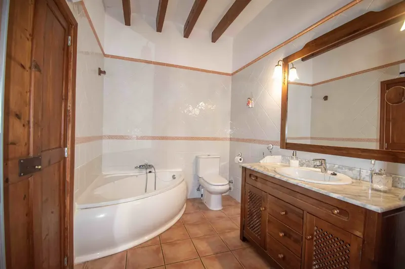Located in the charming village of Es Capdellà, this village house offers exceptional quality of life in one of the most authentic corners — photo 9