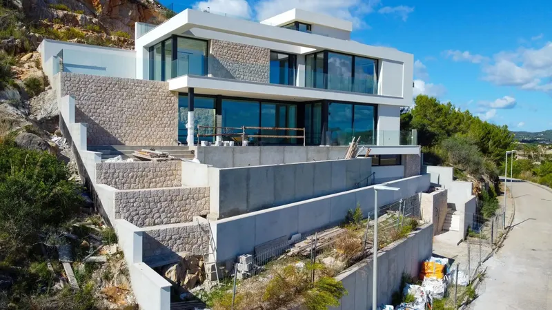 For sale this modern chalet under construction, near completion, of a unique style, with impressive sea and mountain views — photo 1