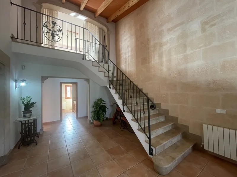 Country house with a stone façade, pool, and olive plantation in Llucmajor — photo 1