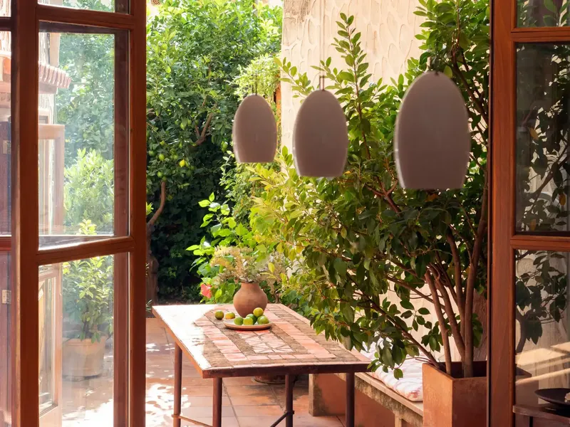 Located in the heart of Fornalutx, this unique terraced house offers a harmonious blend of traditional charm and modern comfort. — photo 6