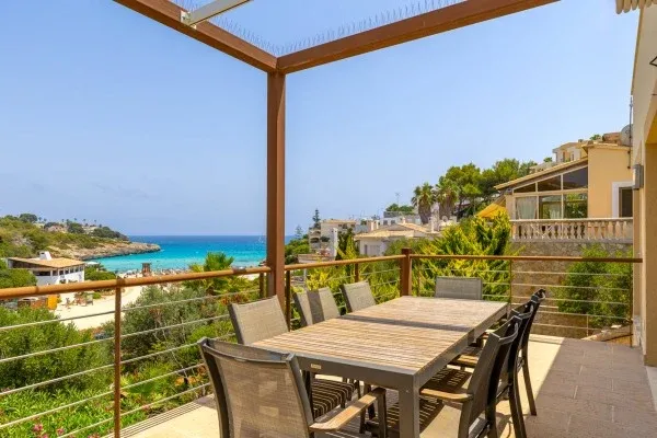 Exclusive villa with direct beach access to Cala Mandía and stunning views — photo 1