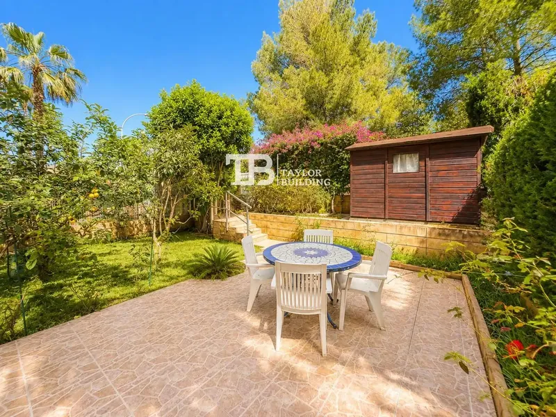 Taylor Building Real Estate presents this magnificent ground floor located in the exclusive and quiet residential area of Son Caliu, one of the — photo 1