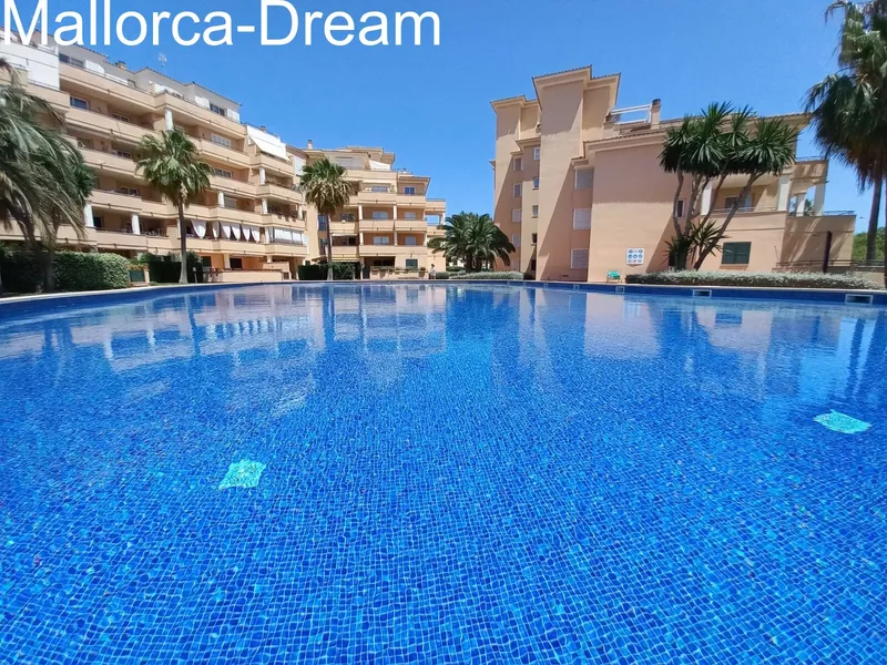 Sa Coma: Modernized ground floor apartment with approx. 60 m² terraces, fantastic pool area, underground parking space & storage room — photo 2
