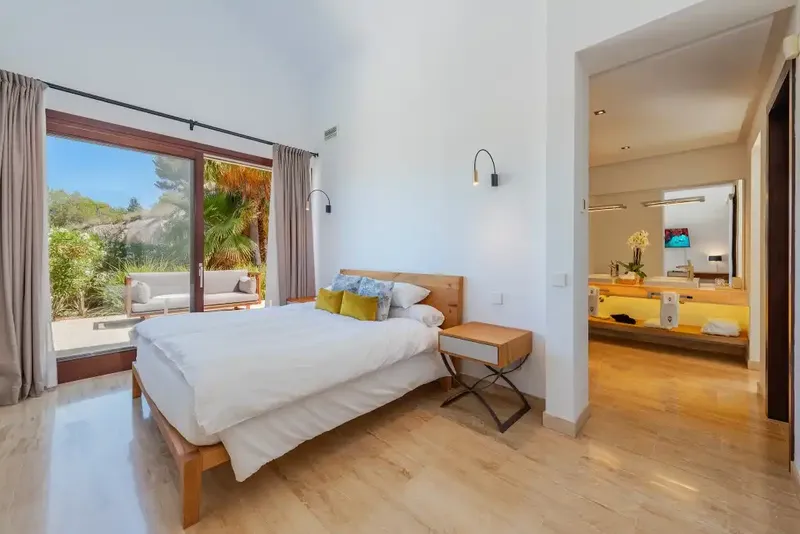 This spacious detached villa for sale in Canyamel is beautifully presented in a chic contemporary style with high ceilings — photo 10