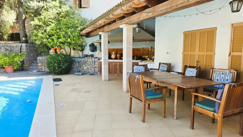 In a sunny and quiet environment in Port de Sóller, we present this magnificent house with garden, private pool and holiday rental license — photo 1