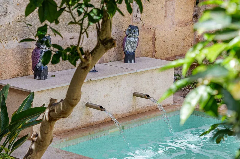 In the Heart of Capdepera: Stylish Townhouse with Large Terrace, Pool Oasis and Castle and Sea Views — photo 11